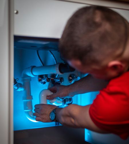Plumber with red shirt